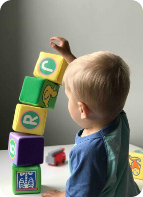 Kid plays during Dutch lesson in The Hague for women